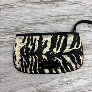 L.A.M.B.  Zebra Pattern Newsprint Wristlet